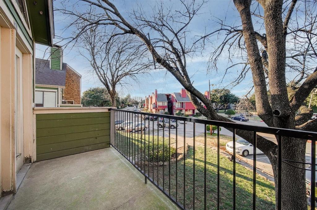 9815 Walnut Street, Unit 210 Dallas, TX 75243 - Photo 10 of 11 a view of swimming pool with a tree in a backyard