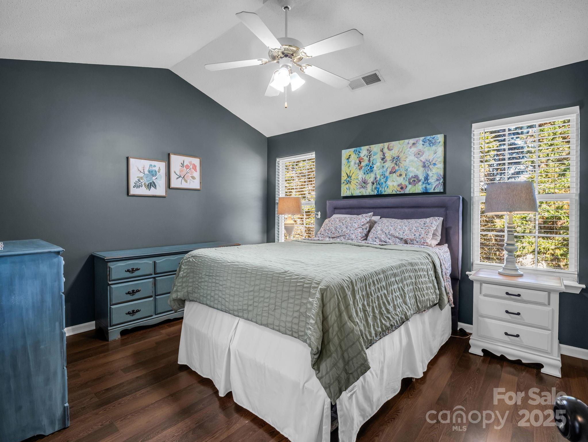 6103 Dane Drive Dallas, NC 28034 - Photo 15 of 29 a bedroom with a large bed and a tv