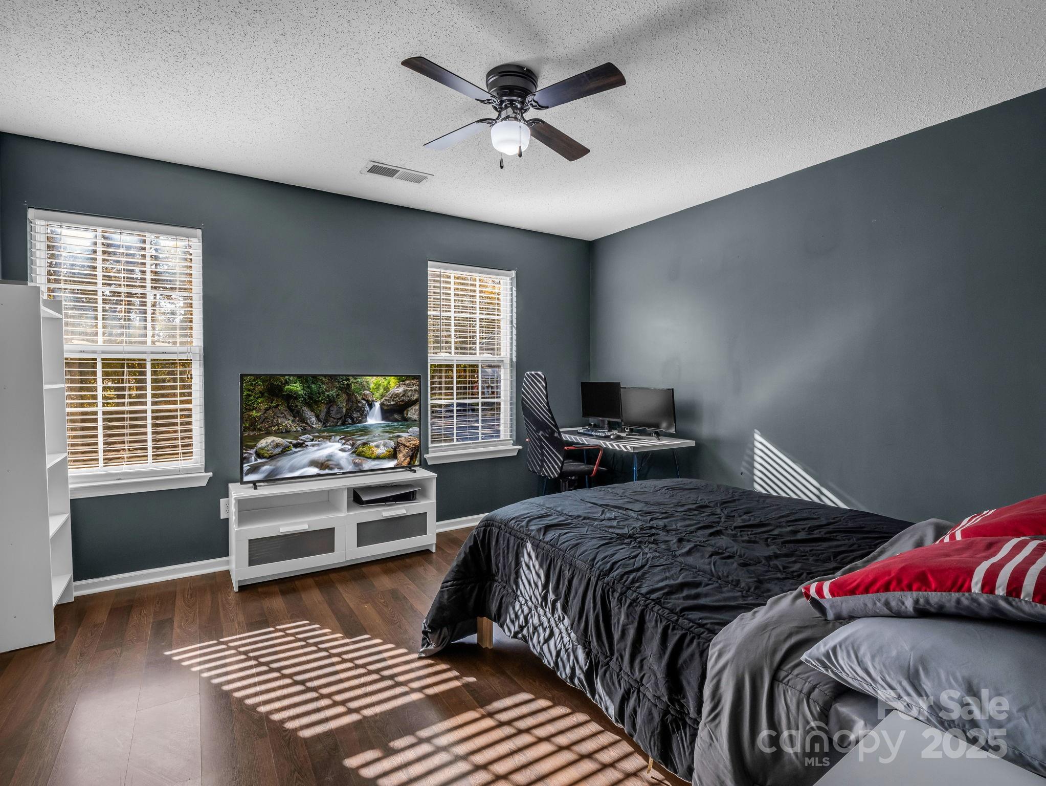 6103 Dane Drive Dallas, NC 28034 - Photo 19 of 29 a bedroom with a bed and a window