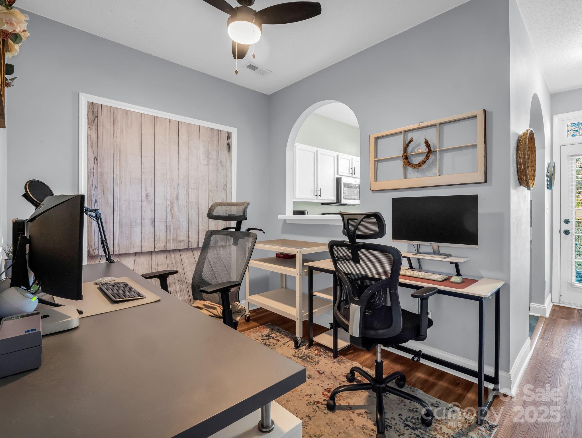6103 Dane Drive Dallas, NC 28034 - Photo 6 of 29 a view of a workspace with furniture and a window