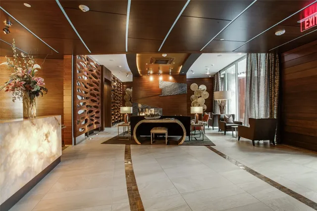 a view of an chairs and tables in the balcony