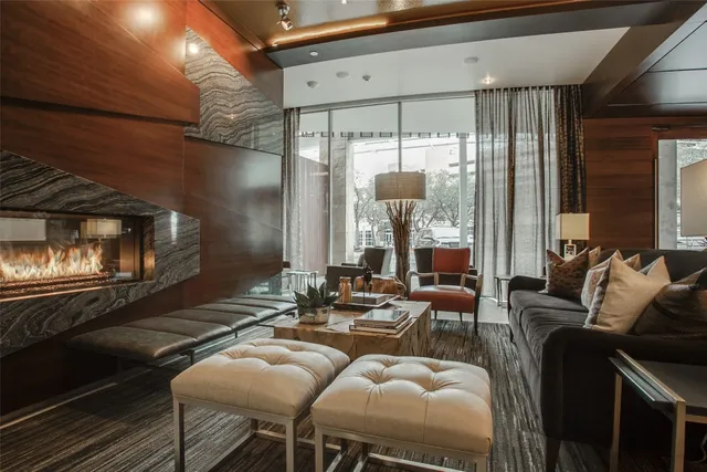 a house with swimming pool in front of it