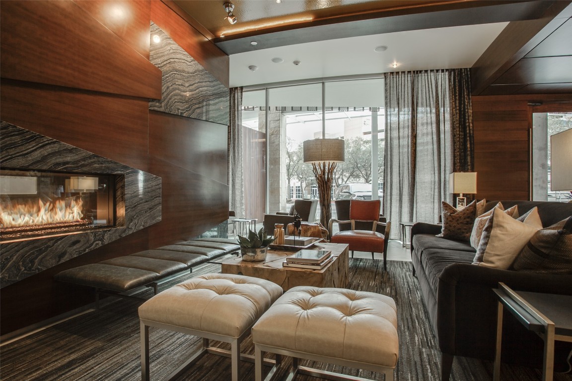 214 Barton Springs Road, Unit 922 Austin, TX 78704 - Photo 16 of 20 a living room with furniture and a fireplace