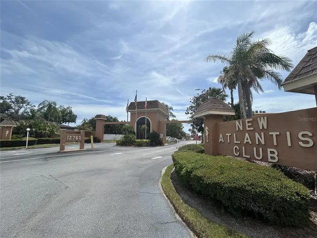 a view of a street with a building in the background