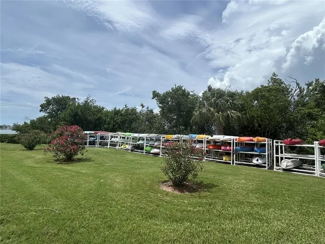 a view of a house with a big yard