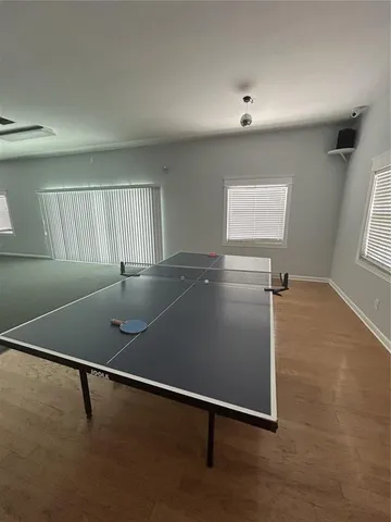 a view of swimming pool with a yard