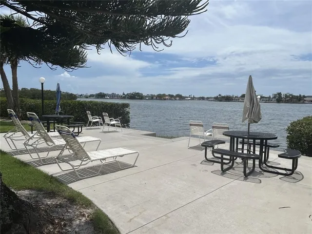 a view of a terrace with sitting area