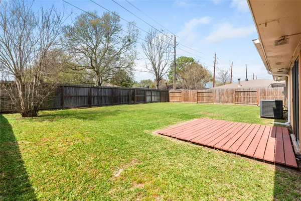 a view of a backyard with a garden