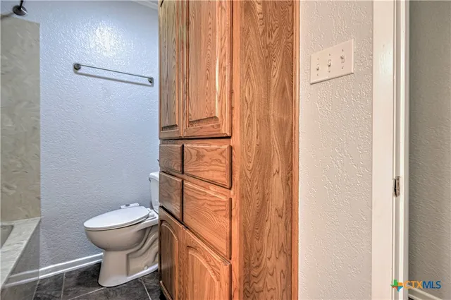 a view of a backyard with a sink and swing