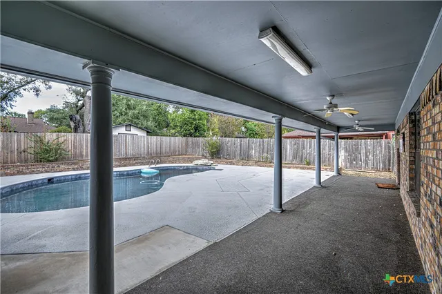 front view of a house with a large window