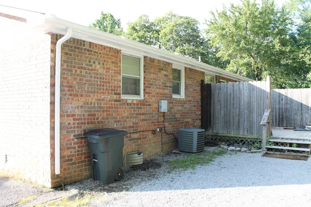 a backyard of a house with a sink