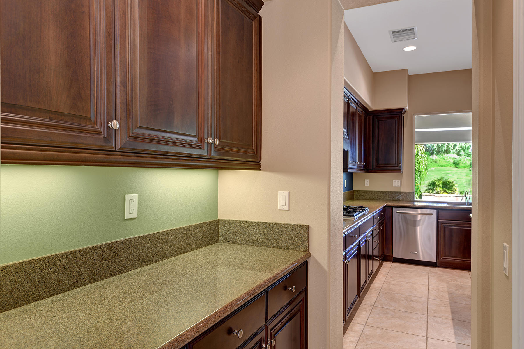 342 Loch Lomond Road Rancho Mirage, CA 92270 - Photo 13 of 35 BUTLERS PANTRY TO KITCHEN MLS