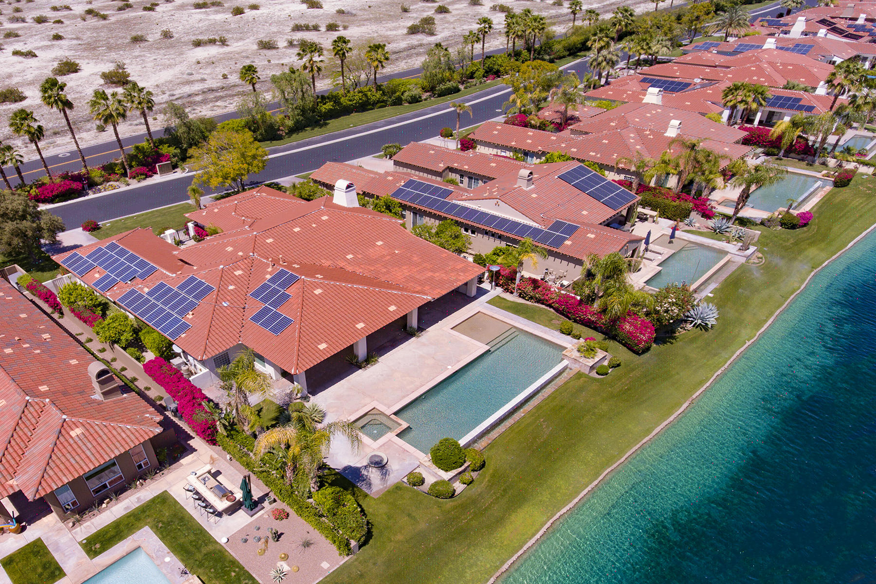 342 Loch Lomond Road Rancho Mirage, CA 92270 - Photo 35 of 35 DRONE DOWN ON LAKE AND HOUSE MLS