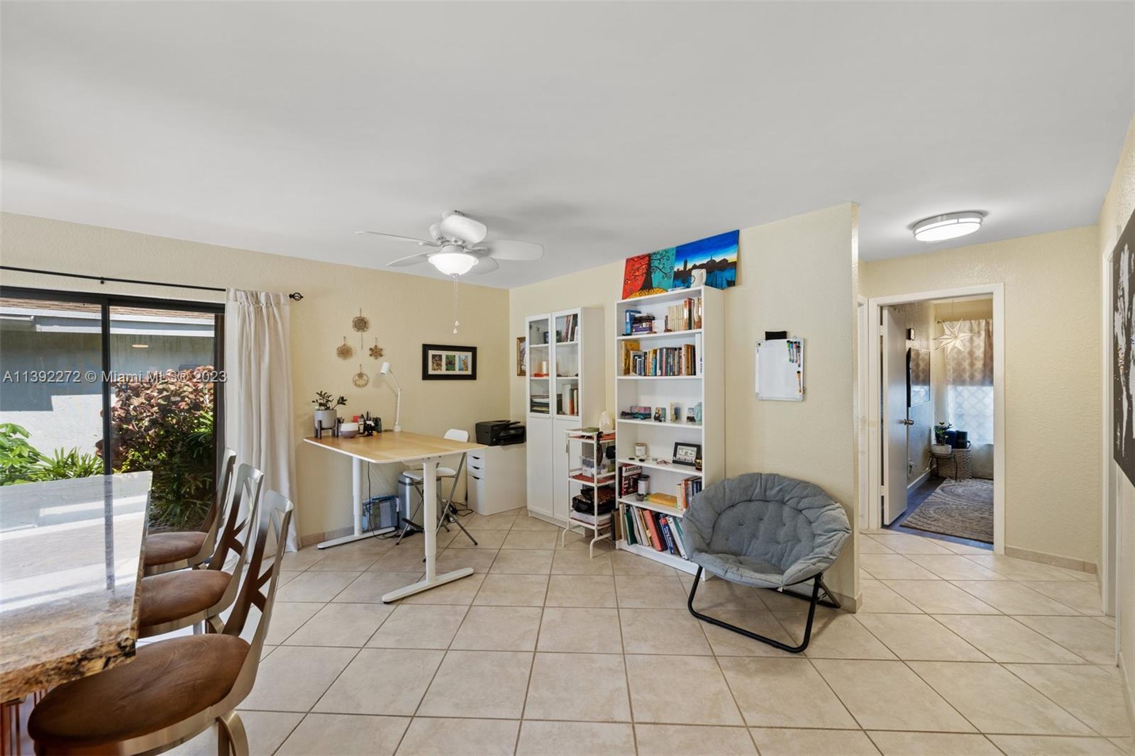 28 Cedar Road Hollywood, FL 33021 - Photo 11 of 43 a room with furniture a rug and a large window