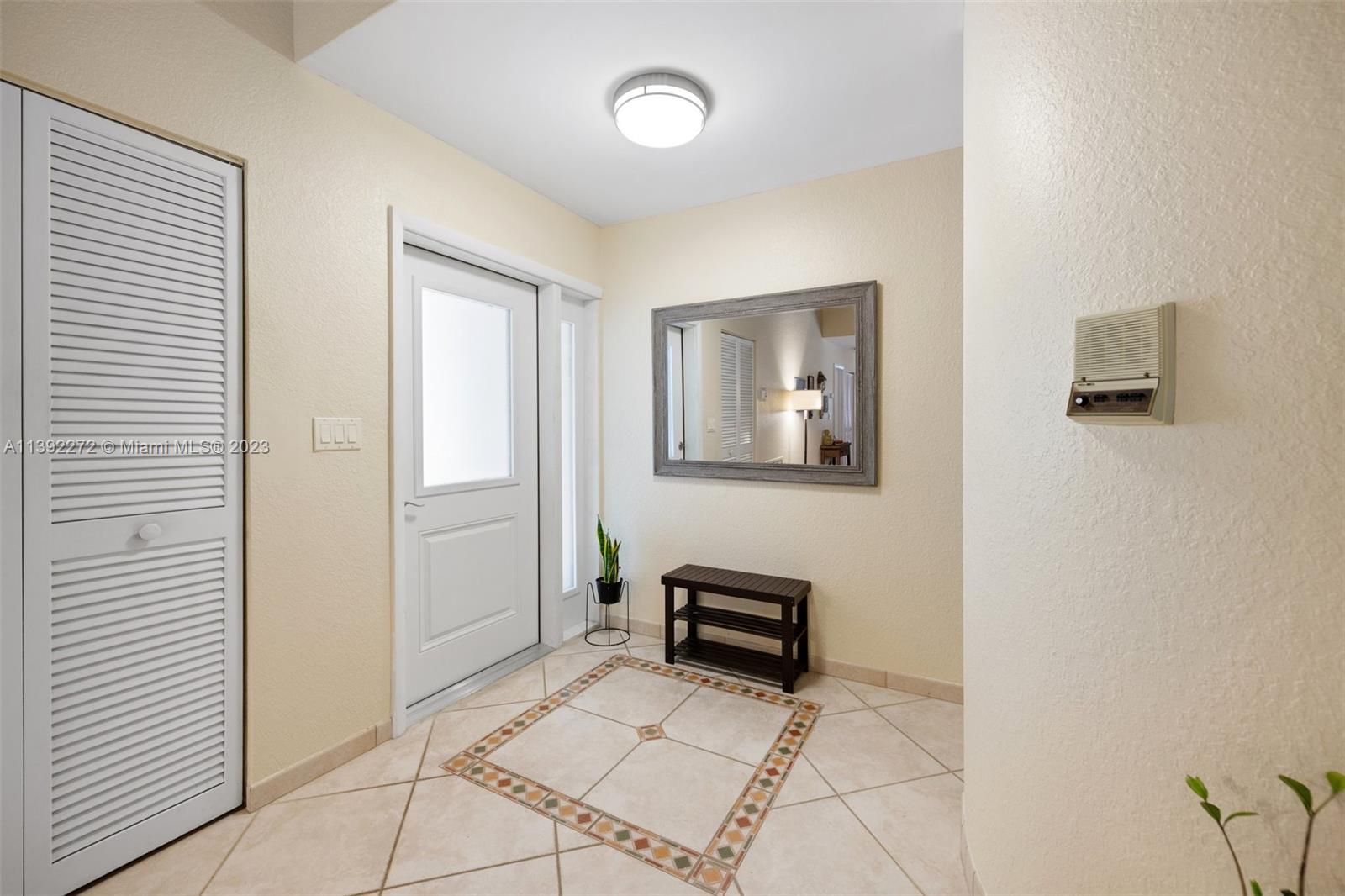 28 Cedar Road Hollywood, FL 33021 - Photo 33 of 43 a view of a livingroom with furniture and a window