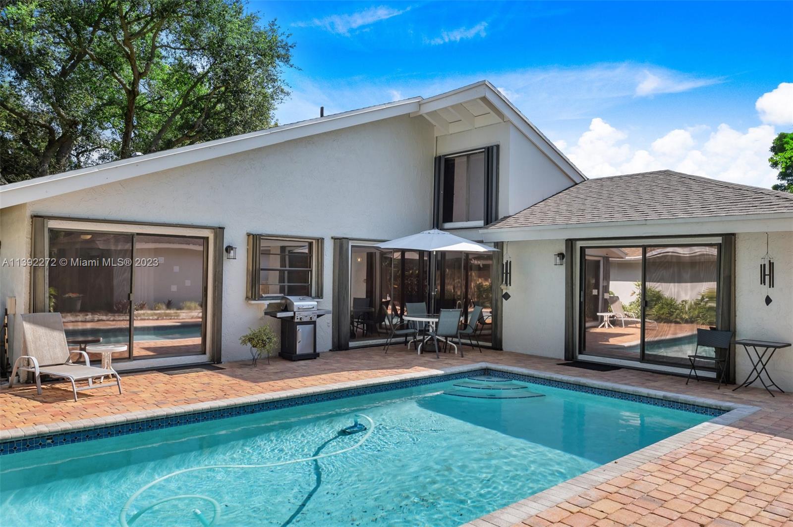 28 Cedar Road Hollywood, FL 33021 - Photo 35 of 43 a view of a house with patio