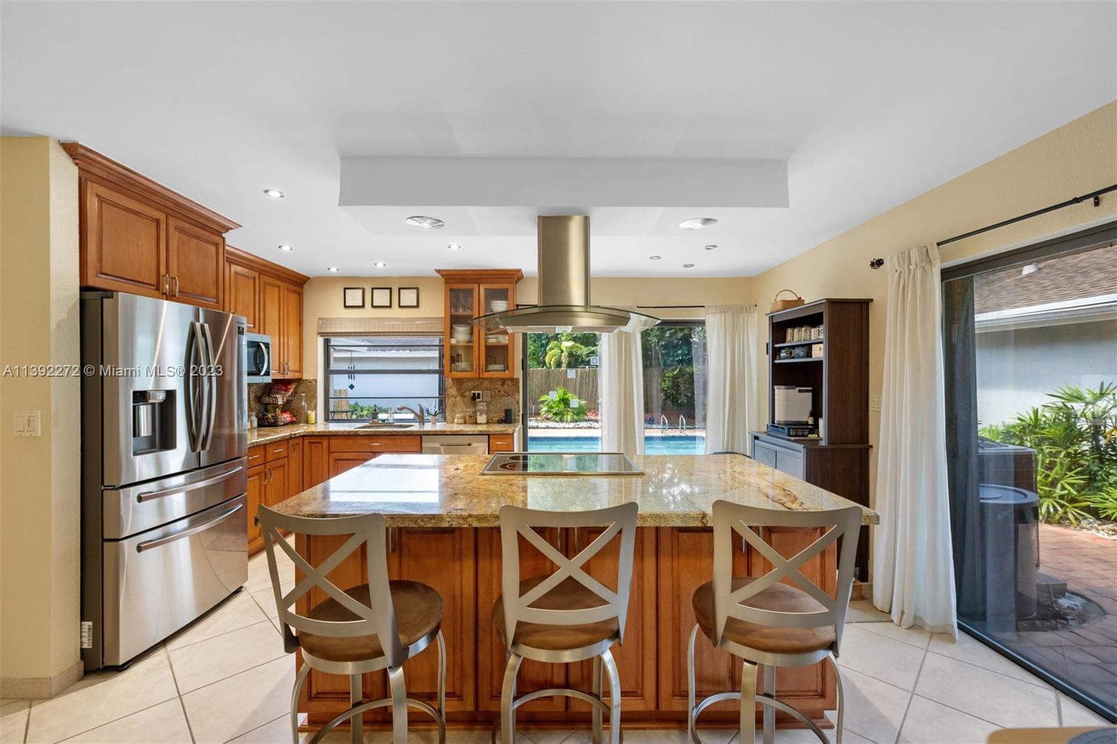 28 Cedar Road Hollywood, FL 33021 - Photo 6 of 43 a view of a dining room with furniture window and outside view