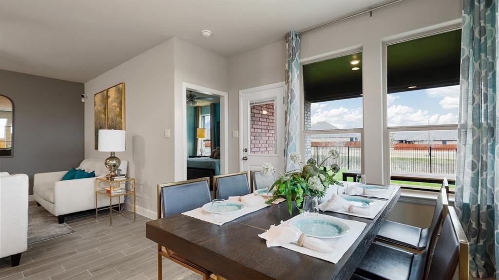 117 Hugo Court Rhome, TX 76078 - Photo 10 of 39 a view of a livingroom with furniture and window