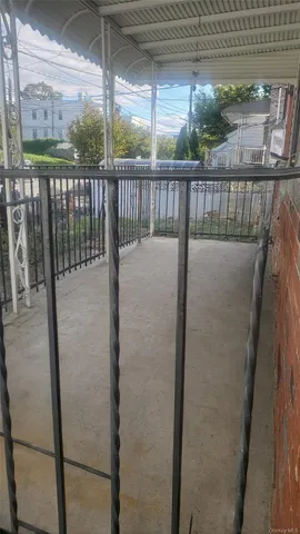 a view of balcony with furniture