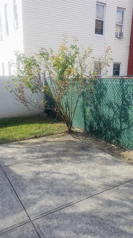 a view of a back yard of the house