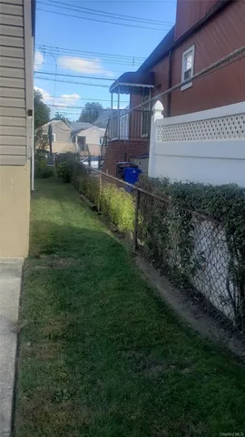 a view of a house with backyard and a window