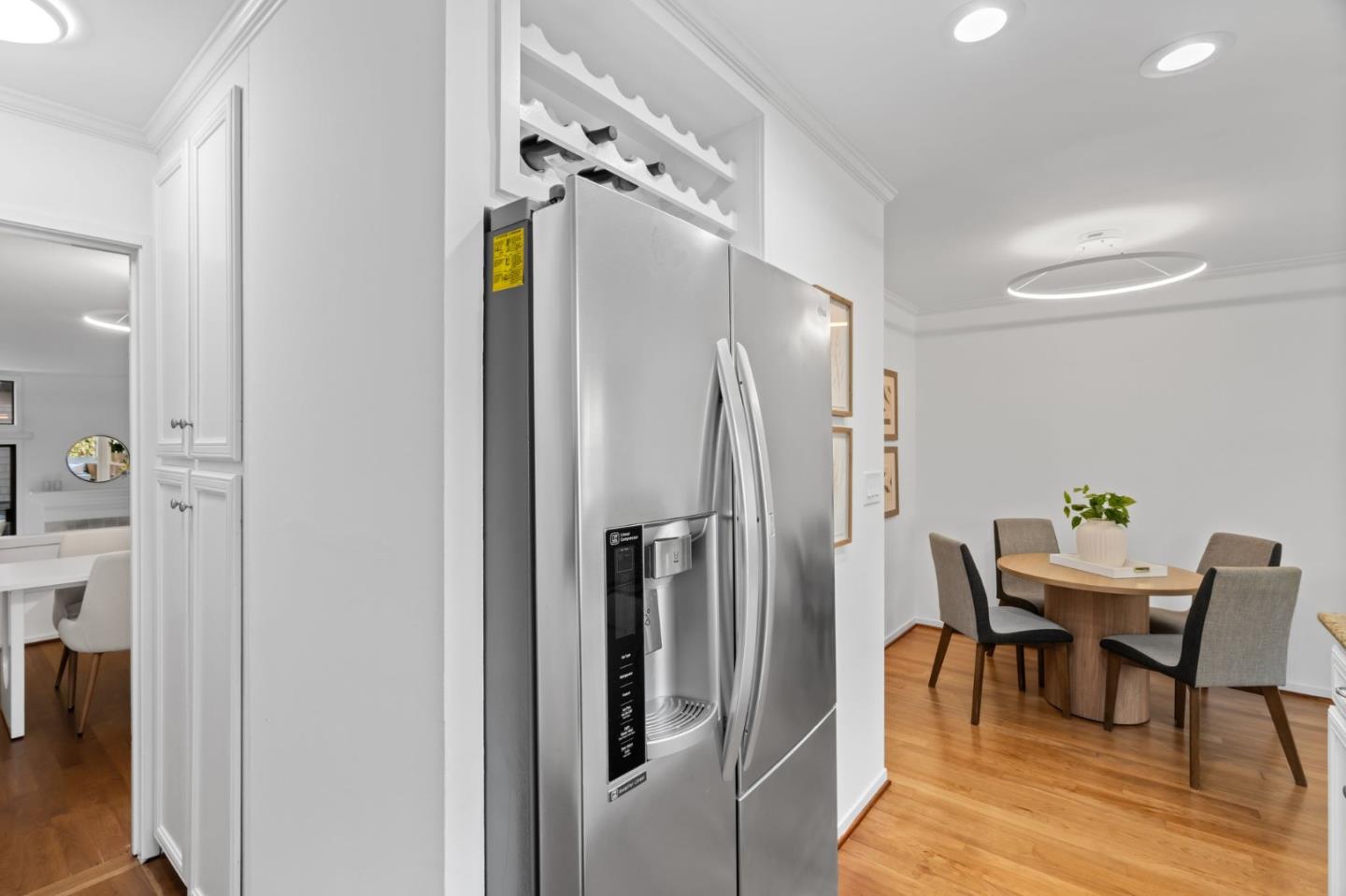 2146 Sand Hill Road Menlo Park, CA 94025 - Photo 13 of 40 a kitchen with stainless steel appliances a refrigerator and a table