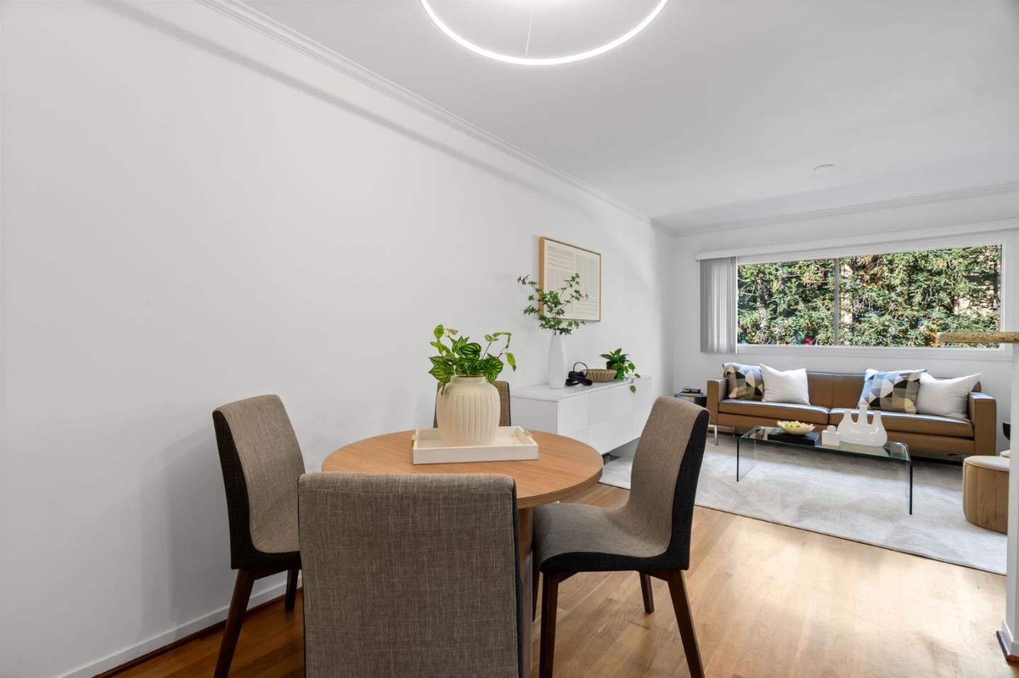 2146 Sand Hill Road Menlo Park, CA 94025 - Photo 16 of 40 a dining room with furniture and wooden floor