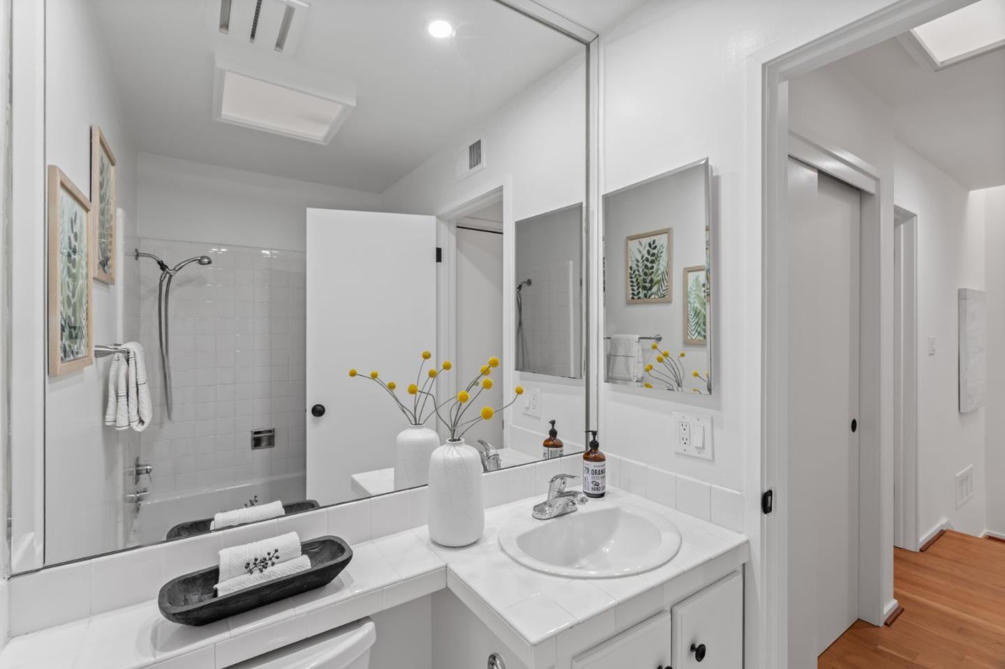 2146 Sand Hill Road Menlo Park, CA 94025 - Photo 22 of 40 a bathroom with a sink double vanity and a mirror