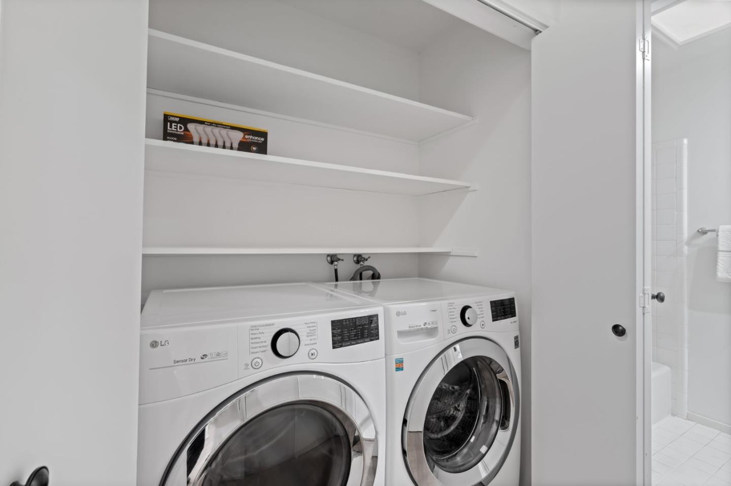 2146 Sand Hill Road Menlo Park, CA 94025 - Photo 32 of 40 a utility room with dryer and washer