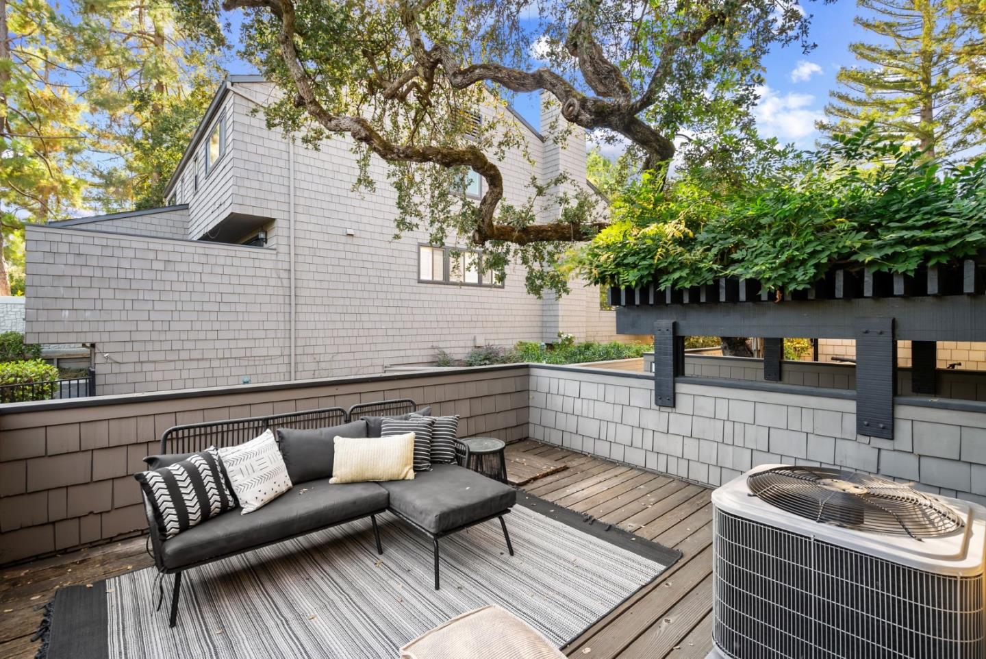 2146 Sand Hill Road Menlo Park, CA 94025 - Photo 33 of 40 a view of a patio with couches and a fire pit
