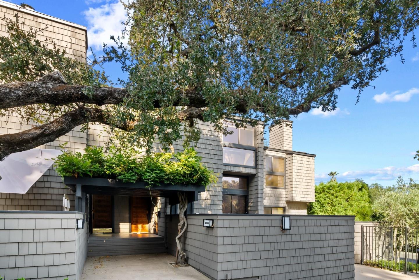 2146 Sand Hill Road Menlo Park, CA 94025 - Photo 37 of 40 a front view of a house with a tree