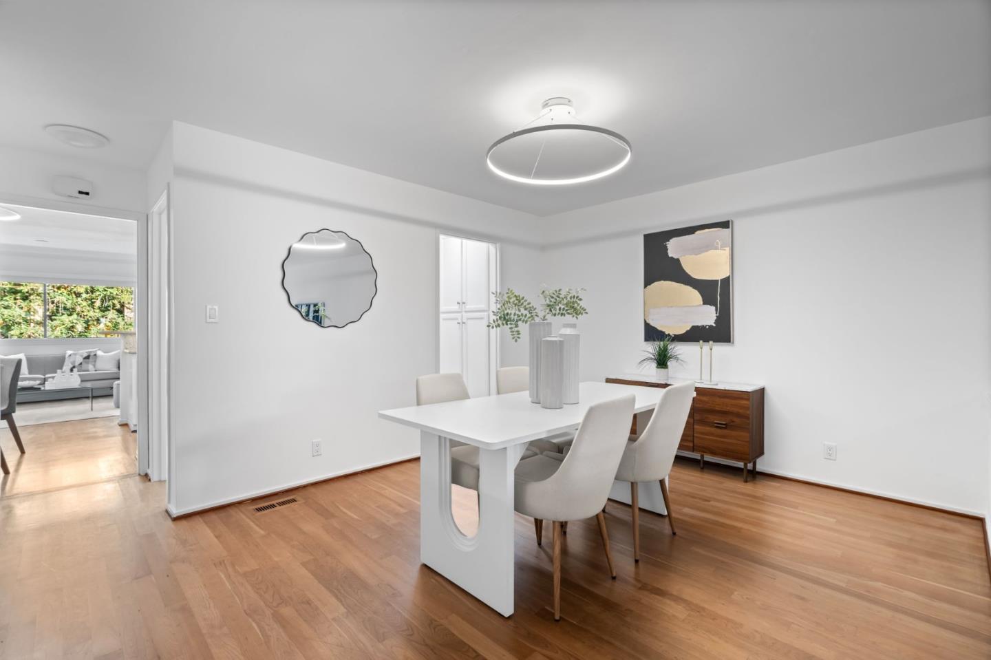 2146 Sand Hill Road Menlo Park, CA 94025 - Photo 6 of 40 a view of a dining room with furniture and wooden floor