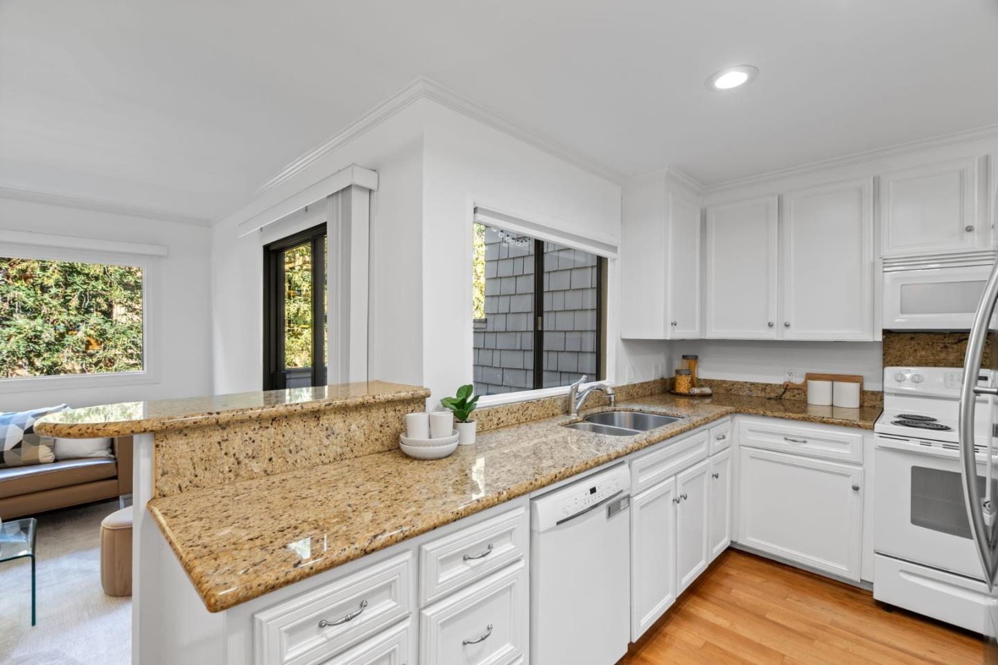 2146 Sand Hill Road Menlo Park, CA 94025 - Photo 10 of 40 a kitchen with sink and cabinets