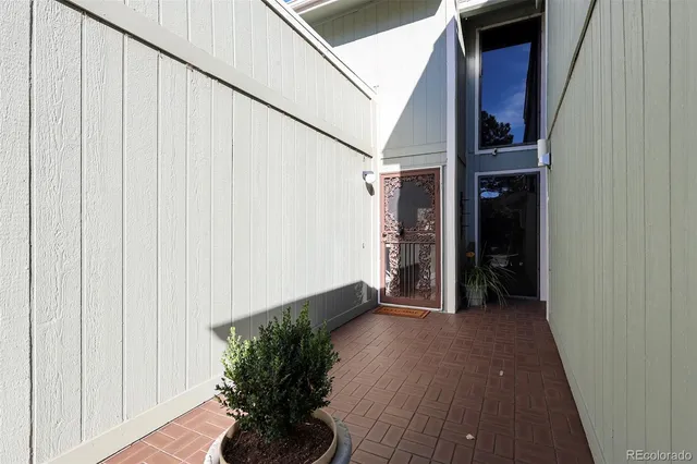 a view of entryway with wooden floor