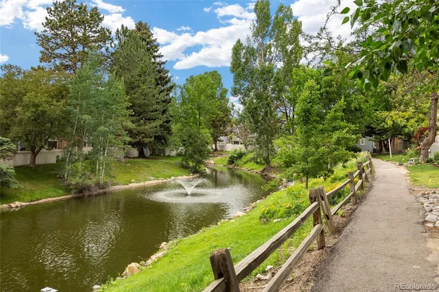 a view of a lake with a garden