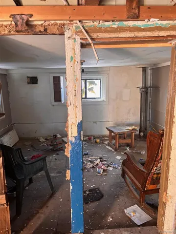 a backyard of a house with outdoor seating