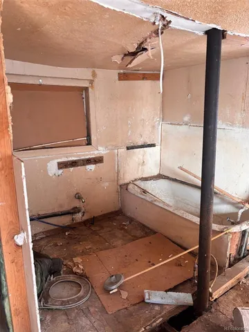 a view of a backyard of the house