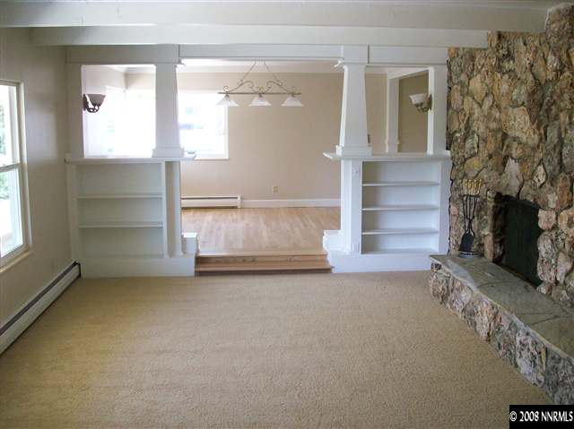 14440 Virginia Foothills Drive Reno, NV 89521 - Photo 2 of 9 an empty room with windows