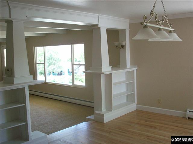 14440 Virginia Foothills Drive Reno, NV 89521 - Photo 3 of 9 a view of a room with wooden floor and windows