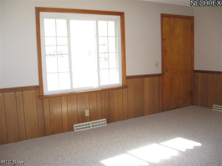 3535-3537 Birchdale Road Northwest Canton, OH 44708 - Photo 6 of 24 Living room has fresh paint and new carpet