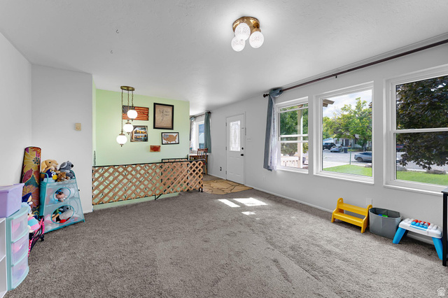 88 West 700 South Payson, UT 84651 - Photo 7 of 27 Recreation room with baseboards and carpet floors