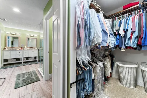 a view of a livingroom with furniture and windows