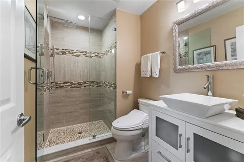 a view of utility room and bedroom