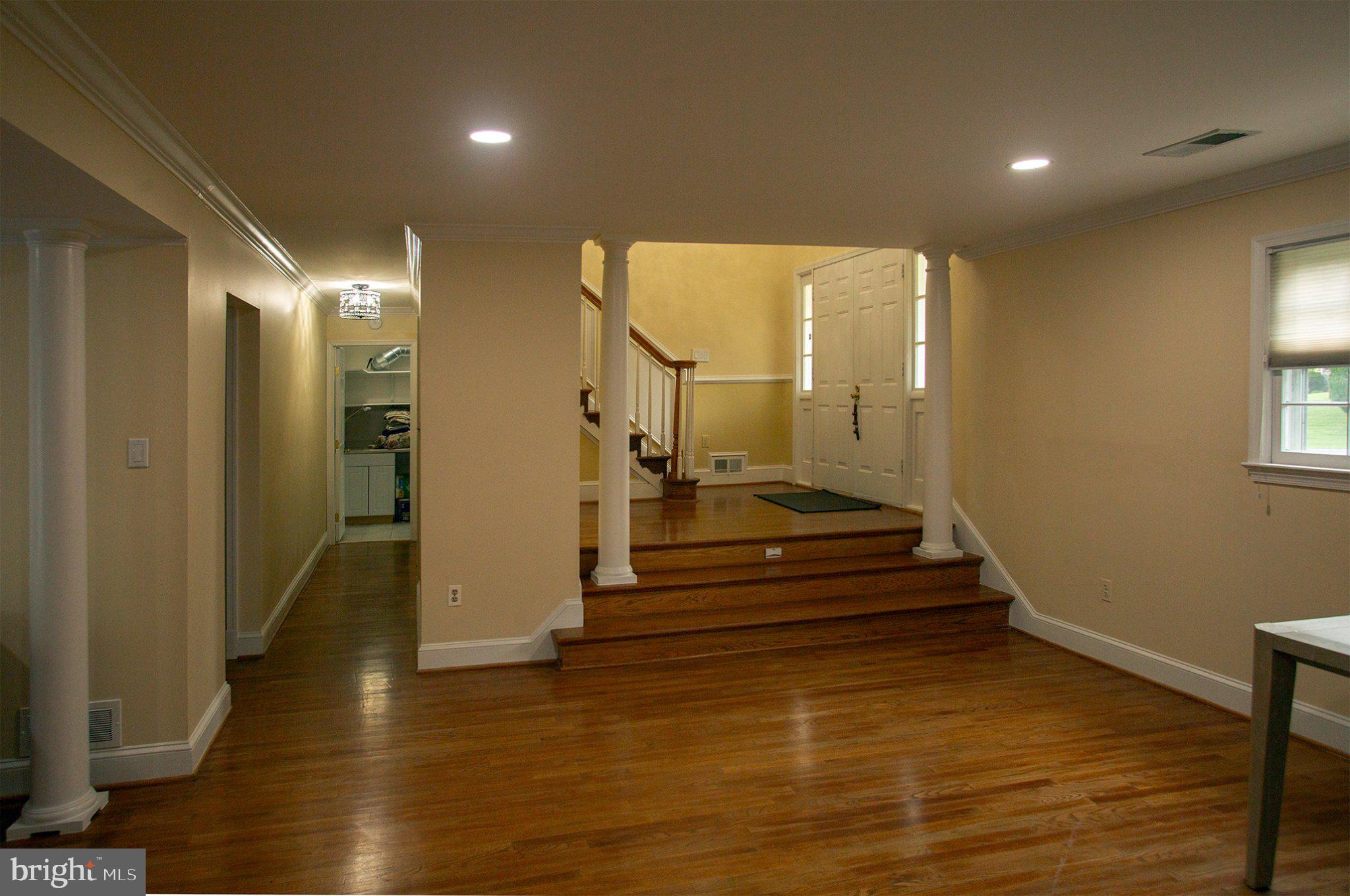 14705 Notley Road Silver Spring, MD 20905 - Photo 5 of 28 Welcoming entry with elegant stairs.