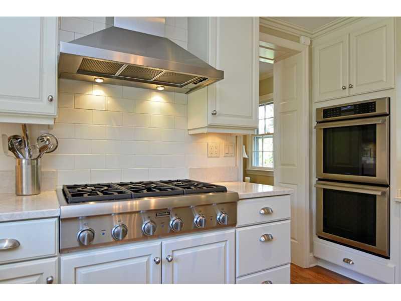 377 Fox Chapel Road Fox Chapel, PA 15238 - Photo 11 of 25 Kitchen. The kitchen features a high-end six-burner gas cooktop with hood and a double oven, both by Thermador.