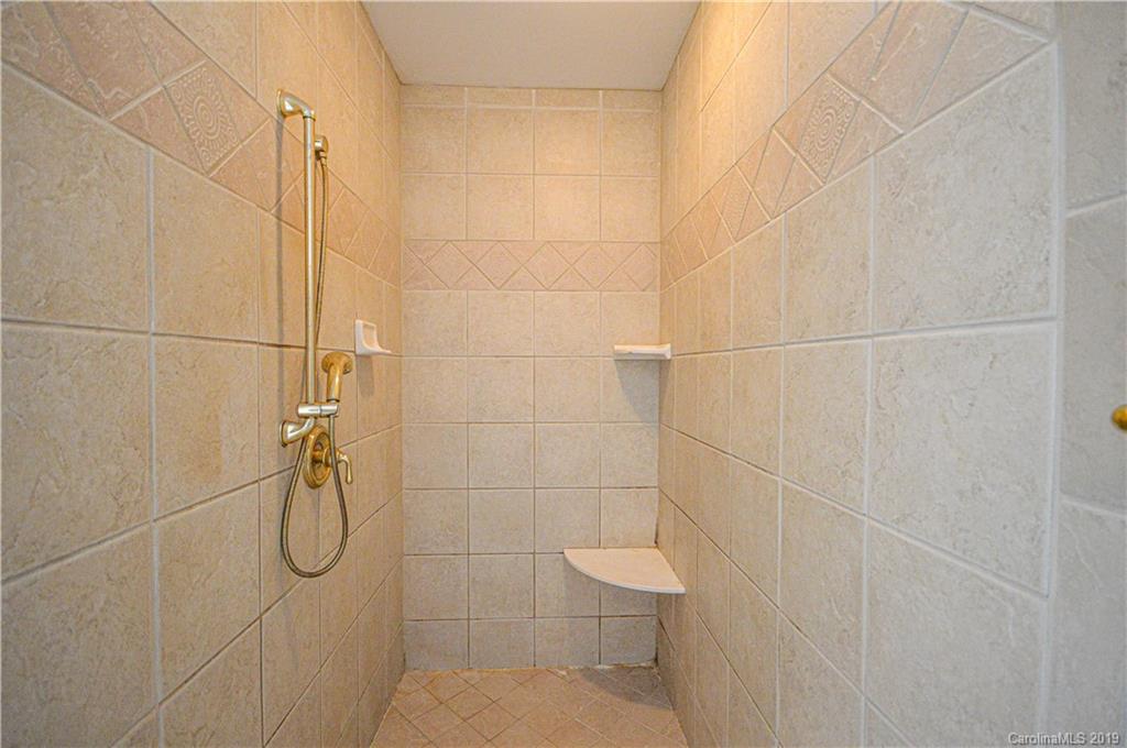2500 Old Pardue Road Lancaster, SC 29720 - Photo 26 of 39 a bathroom with a toilet and a shower