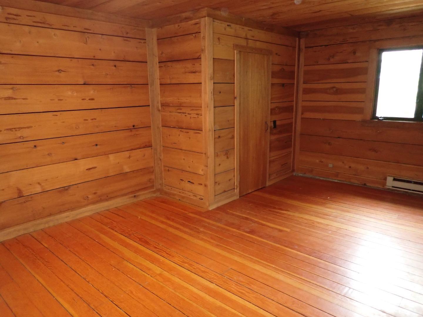 18039 Riverside Drive Sonoma, CA 95476 - Photo 10 of 21 a view of empty room with wooden floor