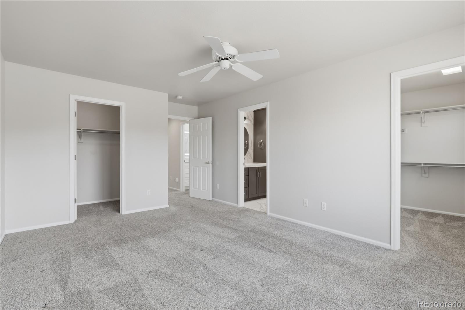 3807 Garnet Way Highlands Ranch, CO 80126 - Photo 20 of 38 a view of an empty room with a ceiling fan