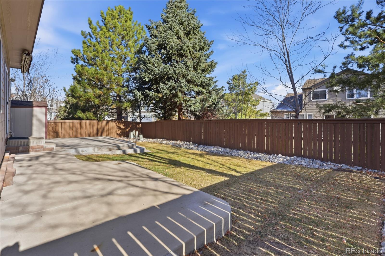 3807 Garnet Way Highlands Ranch, CO 80126 - Photo 33 of 38 a view of a backyard