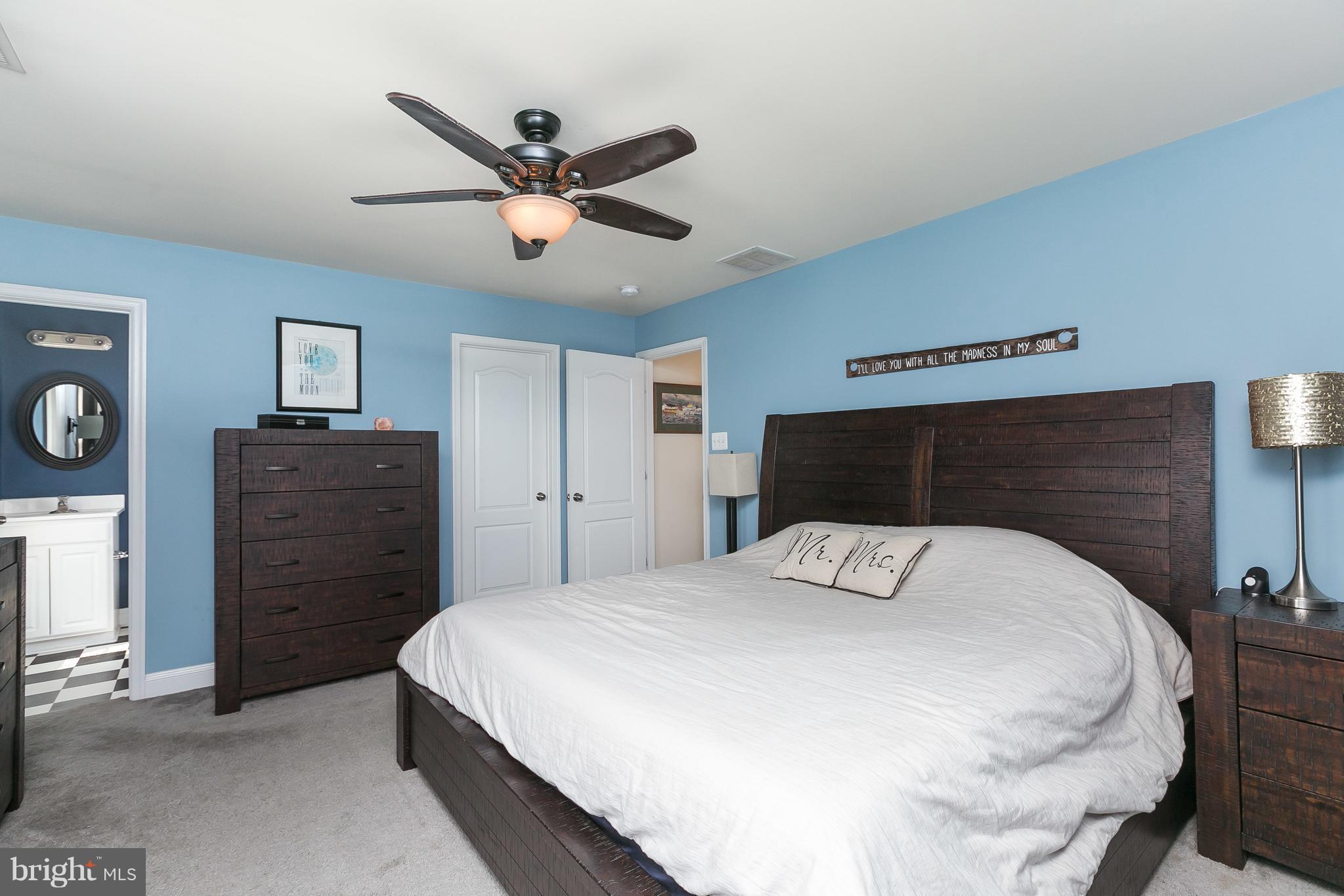 1305 3rd Road Baltimore, MD 21220 - Photo 17 of 27 a bedroom with a bed and a dresser